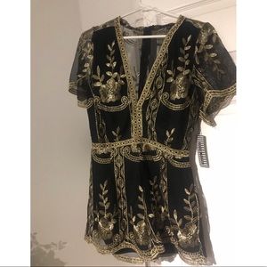 Black and gold romper